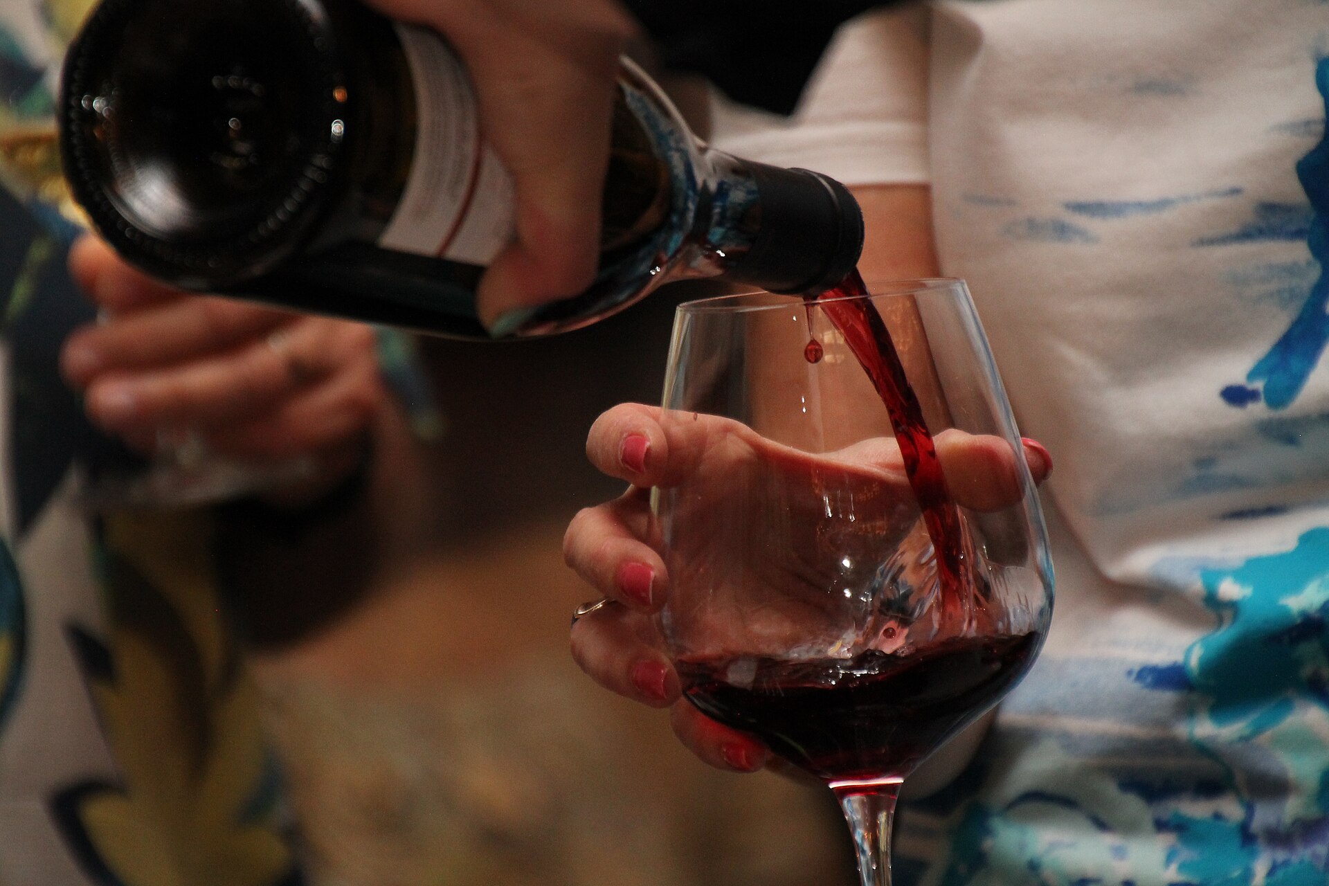 A glass of red poured tableside